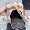 2023-Luxurys Donna Sport Outdoor Zaini Designer Zaini Maniglia Tote Borsone in pelle Borse da viaggio Borsa a tracolla con stampa di lettere di grande capacità 30x33c