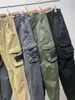 2023 Män och kvinnor Stones Patches Island Vintage Cargo Pants Designer Big Pocket Leisure Sport Trousers Track Fashion Brand Leggings Long Mens Sports 569