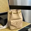 2023 Women crossbody väskor designer mini quiltade fårskinn hink väska svart vit beige högkvalitativ guld hårdvara mode damer korsbod