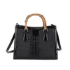 Factory wholesale ladies shoulder bags 6 colors street fashion crocodile handbag elegant solid color leather tote bag Joker embossed black fashion backpack 5050#