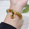 Strand Nafu Peacock Agate Bracelet Old Mine Topaz Safe