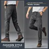 Jeans pour hommes 2023 Six poches pratique Cargo marque tendance jeunesse pantalon de travail droit coupe ajustée grande poche 231113