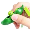 Fidget favors Sojabohnenspielzeug Erdnuss-Erbse Squeeze-a-Bean Schlüsselanhänger Fingerpuzzles Focus Extrusion Erbsenanhänger Stressabbau Kinder mit Autismus brauchen Dekompressionsgeschenk