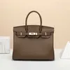 Platinum Designer Tote Bag 2024 Dames Hoofdlaag Koeienhuid Handtas Eén schouder Schuin Straddle Lock Leer Dames