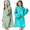 Imperméables Poncho de pluie imperméable élégant pour femme avec manches à capuche et grande poche sur le devant 230414