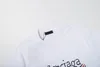 Nueva camiseta para hombre Diseñador en blanco y negro Cofre Números alfanuméricos clásicos Aerosol directo Moda para hombres y mujeres Algodón de manga corta de gran tamaño 3XL # 99