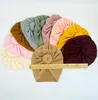 Automne hiver nouveau enfant chapeau beignet Beanie bébé solide rayure nouveau-né indien chapeau Pom Pom balle infantile Bonnet Skullcap enfant en bas âge Turban