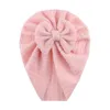 Cappello indiano per bambini con fiocco in cotone smerigliato Cappello per cofano caldo invernale solido a righe per bambini Accessori per capelli con berretto con fiocco twist carino neonato