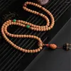 Strand ankomst Nepali Rudraksha 108 Mala pärlor Handsträng snidad olivkärna Buddha Pendant Armband Buddhist smycken Dropship