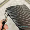 Lambbskin Clutch Men Bag Bag مقاومة للماء حقيبة سفر ماء أصلية من الجلد البوليستر للجنسين سستة رسالة صلبة ناعمة من الجلد