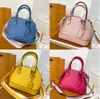 디자이너 Alma BB Shell Bag Women Patent Leather Flower 엠보싱 숄더백 자물쇠 크로스 바디 백 핸드백.