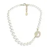 Pendant Necklaces New pearl rhinestone necklace with fashionable and elegant twist pattern collarbone sweater chain jewelry