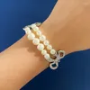 Collana di orecchini con bracciale di perle grandi e piccole con gradiente di alta qualità per gioielli da donna