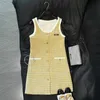 Grundläggande avslappnade klänningar Designer Mi * 23SS Autumn and Winter New Yellow Plaid ärmlös tank topp kvinnor klänning kändis liten doftstil underkläder 9wcw