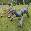 Electricrc Animals RC Dinozaur Raptor Robot Electronic Inteligentny 24G Pilot Muzyka lekka zabawka elektryczna dla dzieci Prezent 231114