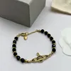 Stilista di marca Braccialetti con ciondoli Pianeta di lusso Gioielli da donna Saturno Catena Bracciale Perla di metallo per donna Bracciale in oro rtfd