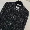 Jesień czarny kontrast kolorowy sweter sweter z długim rękawem okrągły szyja podwójne kieszenie na pojedyncze swetry płaszcze B3N101756
