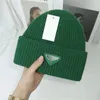 2023 Nouveaux bonnets designer hiver bonnet hommes et femmes mode triangle lettres chapeaux en tricot de luxe automne bonnet de laine géométrique unisexe chapeau de crâne chaud tête de protection