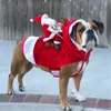 Vêtements pour chiens Costume de Noël pour chien de compagnie amusant Père Noël équitation une robe de cerf Veste Vêtements rouges équitation une robe de cerf Fournitures de Noël pour animaux de compagnie 231114