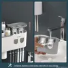 New Magnetic Adsorption Inverted Toothbrush Holder Wall -Automatic Toothpaste Squeezer Storage Rack Bathroom Accessories