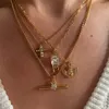 Подвесные ожерелья мода бохо золотой цвет кросс -хрустальный циркон ожерелье простые темперамент для женщин -ювелирных изделий для женщин оптом