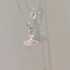 Colliers pendentifs Collier broche entièrement en diamant, conçu par une niche féminine, polyvalent pour les chaînes de clavicule européennes et américaines, planète titane