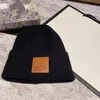 Accueil Designer Beanie L Cap Top Qualité Hiver Hommes En Cuir Étiquette Femmes Chapeaux Tricotés Cadeau De Noël Chapeau Eather Abel