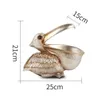 Dekorativa föremål Figurer Big Mouth Pelecanus Bird Home Organizer Harts Art Craft For Keys Smart Phone Notebook Scissors Remote Control Case Holders 231115