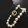 Pendant Necklaces New pearl rhinestone necklace with fashionable and elegant twist pattern collarbone sweater chain jewelry