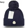 Autumn and Winter Monclir Women's Knit Hat Classic Designer M Beanie Cap Men's Rabbit Päls termisk mössa är tillgänglig
