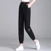 Pantaloni da donna sportivi in seta di ghiaccio a prova di zanzara ad asciugatura rapida per le donne in stile estivo sottile con fettuccia laterale. Casual corto corto da uomo