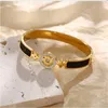 Europa Amerika Top Designer sieraden dame vrouwen titanium staal zwart wit email gegraveerde letter 18k gouden bangle armband