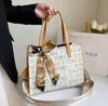 Factory sales shoulder bag elegant geometric printing retro handbag sweet little fresh ribbon bow fashion handbags street trend contrast leather backpack 616