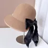 Bérets élégant et élégant chaîne de perles françaises noeud Streamer fourche arrière bassin chapeau femme grand bord laine haut pêcheur