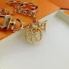 2023 Fashion Flower Design Keychain Charm clé Anneau Men et femmes Party Couple Cadeau de clés