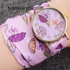 Relojes de diseñador Nuevo estilo Hebilla Libre Moda Correa de tela Reloj Exquisito Flor fragmentada Pequeño patrón fresco Cuarzo