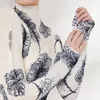 Robes de travail Miyake imprimé T-shirt haut femmes 2023 automne ensemble mode et polyvalent taille haute mi-longue robe deux pièces