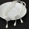 Set di gioielli da sposa Elegante strass Perla Collana con goccia Orecchini da sposa per le donne Regali Collane di fiori multistrato collares 231116