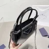 23SS Projektanci Kobiety skórzane torby Torby Najwyższej jakości torebka Shuder Crossbody Triangular Ogad Bag na zakupy luksurys Messenger Ladies Torebki podróżne torebki 27 cm