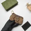 G Bag Portefeuille de luxe pour femmes Hommes G Portefeuilles en cuir Pochette en cuir véritable Luxurys Designers Titulaires de cartes Porte-passeport Embrayage Femmes Sacs à main 3