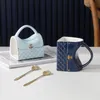 Tassen Kaffeetasse Teetasse Set Tassen Keramik Reisehandtasche geformt mit Löffel für Frauen 231116