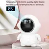 Aquecedores de espaço Aquecedor de mão de bolso Aquecedor de mão bonito com mãos móveis USB Spaceman em forma de aquecedor de mão reutilizável para férias de Natal YQ231116