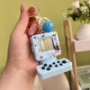 Keychains 1pc Mini Gaming Console Key Chains Handheld Game Players Electronic Games Machine Fun Birthday Keychain Gift for Children