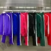 Mens Tracksuits Fashion Mens Tracksupants Tweatpants Womens Disual Tracksuit 2 قطعة مجموعات السترات الطباعة الكلاسيكية دعاوى الرجال رياضة الركض السراويل التعرق 23SS