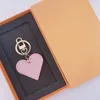 Дизайнерский матч-матч Llavero Keyring Мужчины в форме сердца Keyring Women Women Chain Charm Key с подарочной коробкой