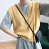 Kvinnors västar 2023 Spring Women's Sticked Vest Korean Edition Casual Loose Sweater Wearing Horse Clip