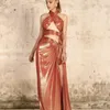 Casual jurken 2023 Zomer vrouwen sexy mouwloze halter Hollow Out High Slit Shiny Long Dress Fashion Design Nightclub Party