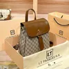حقيبة 22 ٪ من مصمم حقيبة يد هونغ كونغ وكيل شراء أصلي من الجلد للنساء المعنى الجديد مكانة وظهر سفر متعدد الاستخدامات