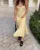 Grundläggande avslappnade klänningar sommarblommor Susender Sun Dress Kvinnliga Holiady Beach ärmlösa remmar lindade fiskstjärna Slim Backless Vestido 231116