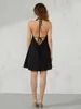 Abiti casual Wsevypo Halter Tie-up Ritaglio Flowy Beach Dress Donna Sexy Backless Senza maniche Svasato Pieghettato A-Line Mini Club Streetwear